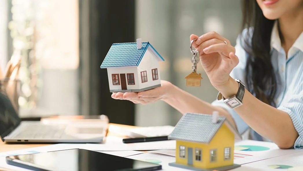 Buying a home in Calgary — receiving the keys to a new house